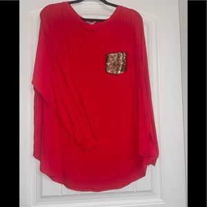 Chic Soul long sleeve hi/low shirt with sequenced pocket. Worn and washed once.